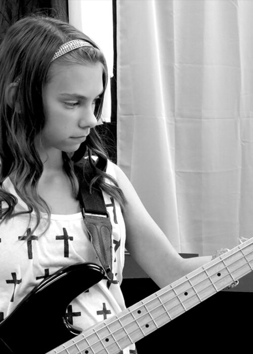 Bass Guitar Lessons - Photo by Andy Iorio